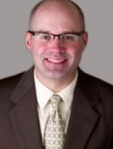 Portrait of Justin B Colquhoun PAC