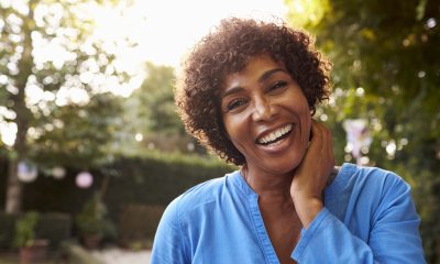 Woman smiling and looking at the camera