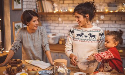 Mom and daughters baking for holidays