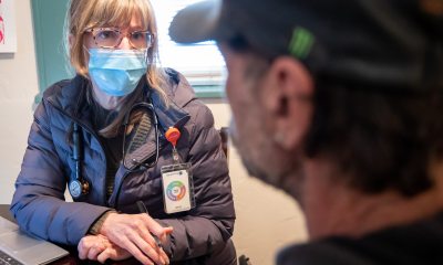 Kathy Kernan, a PeaceHealth nurse practitioner, meets with Jeffrey