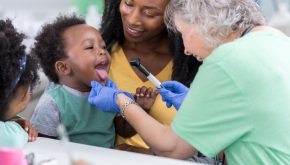 A caregiver provides care to a young child