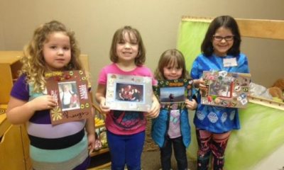 Four children hold up crafts they made at a Stepping Stones session, made possible by PeaceHealth Hospice Hope Bereavement Services