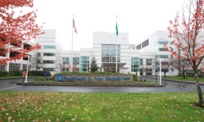 Front entrance of St. John Medical Center in Longview, Washington on an autumn day.